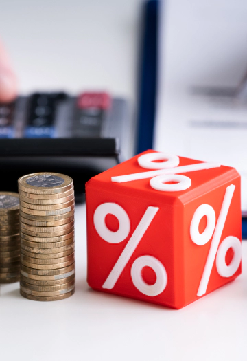 Coin and a rectangular model next to it